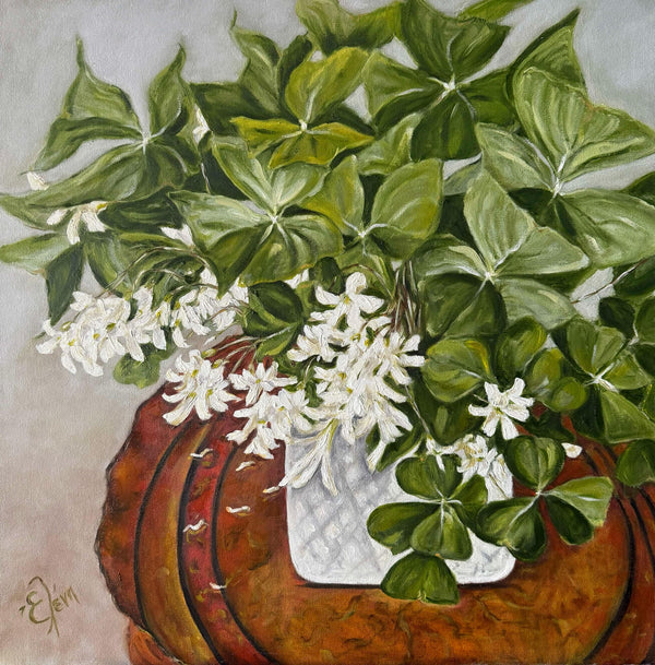 a vase of shamrocks
