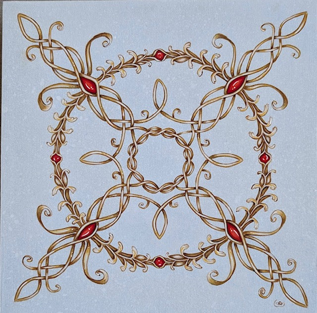 Decorative gold and red pattern on a light blue background