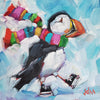 a puffin wearing skates and a colourful striped scarf