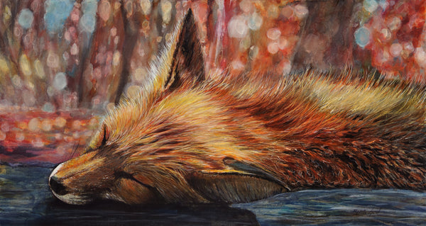 a sleepy fox on the forest floor