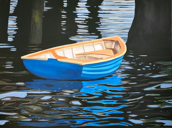 Blue and orange boat floating on water with reflections