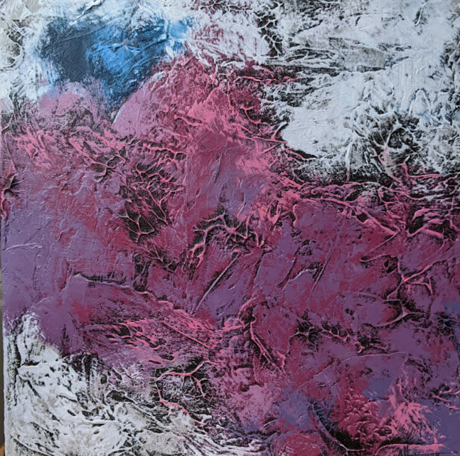 Abstract art with pink, purple, and blue colors on a textured surface