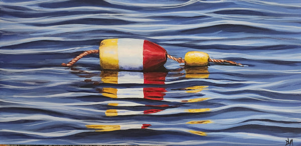 Colorful buoy floating on water with wavy background