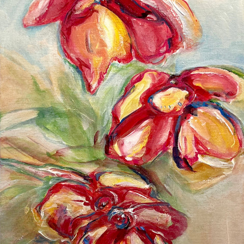 An impressionistic painting of three red and yellow flowers with green leaves on a soft beige and gray background, signed HANIK at the bottom left.