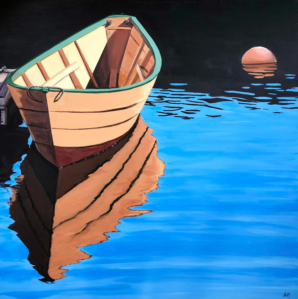 Wooden boat reflected in water with a sunset in the background