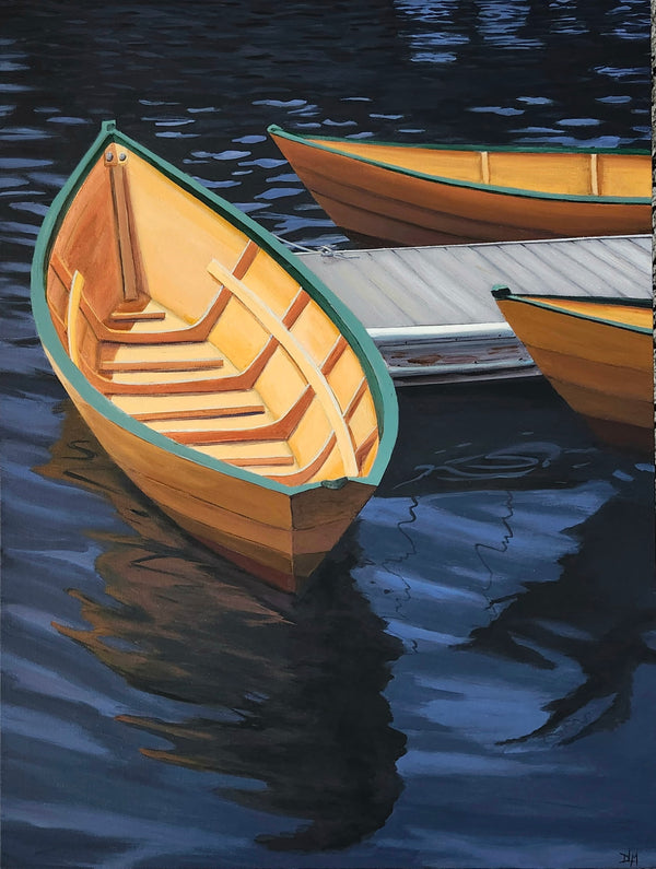 Two wooden boats on a body of water with a dark blue reflection.