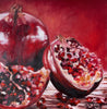 Painting of a pomegranate with one half open, showing seeds on a red background.