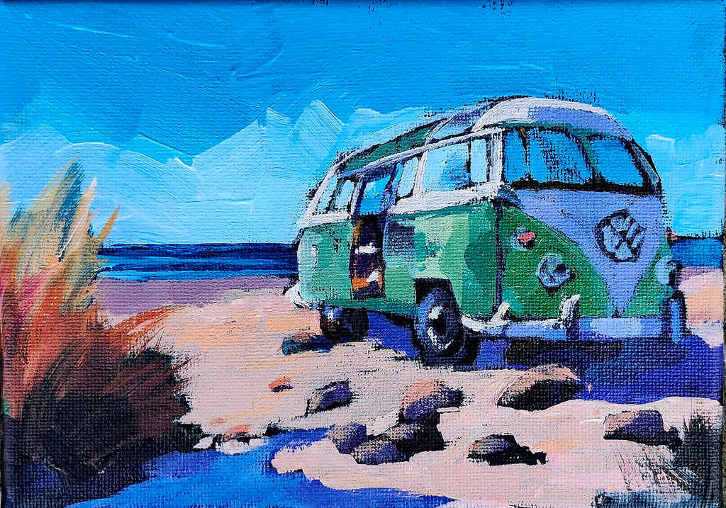 green and white VW van on the beach